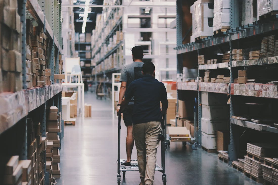 Warehouse fulfillment shelving with cartons ready to ship