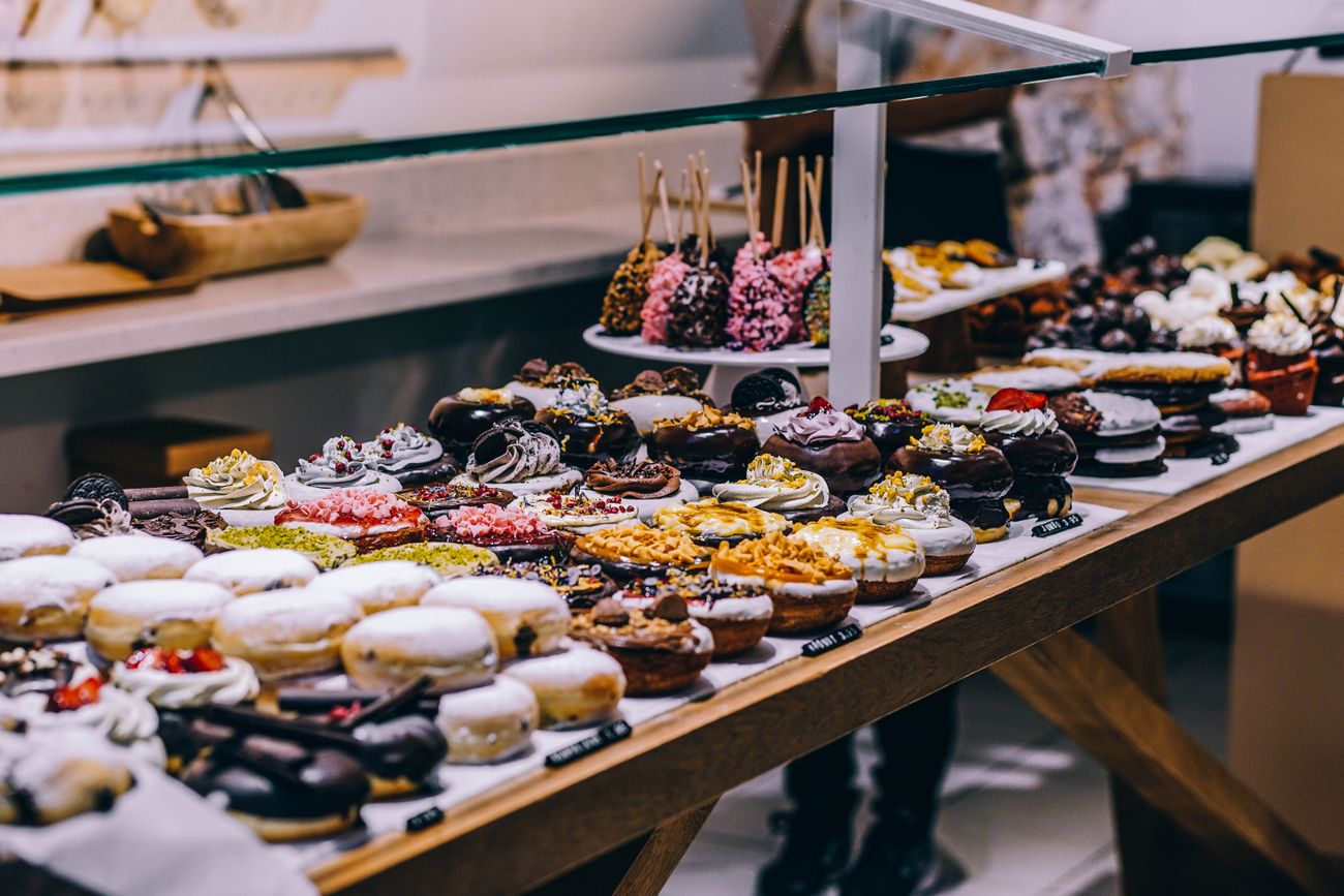 Bakery counter with branded boxes, business cards and printed menus